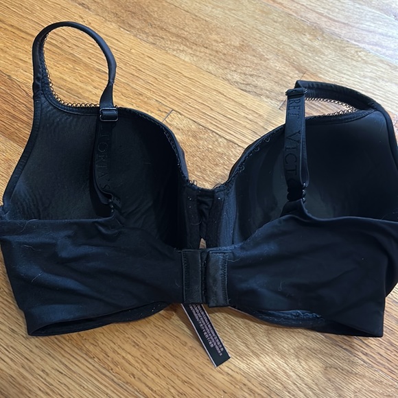 Black padded bra.  Straps can go racer back or normal vertical straps - Picture 2 of 3